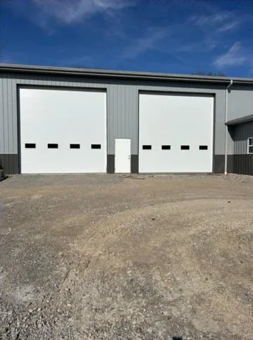 Commercial overhead doors on a steel building installed by A&K Metal and Doors in Southern Ohio